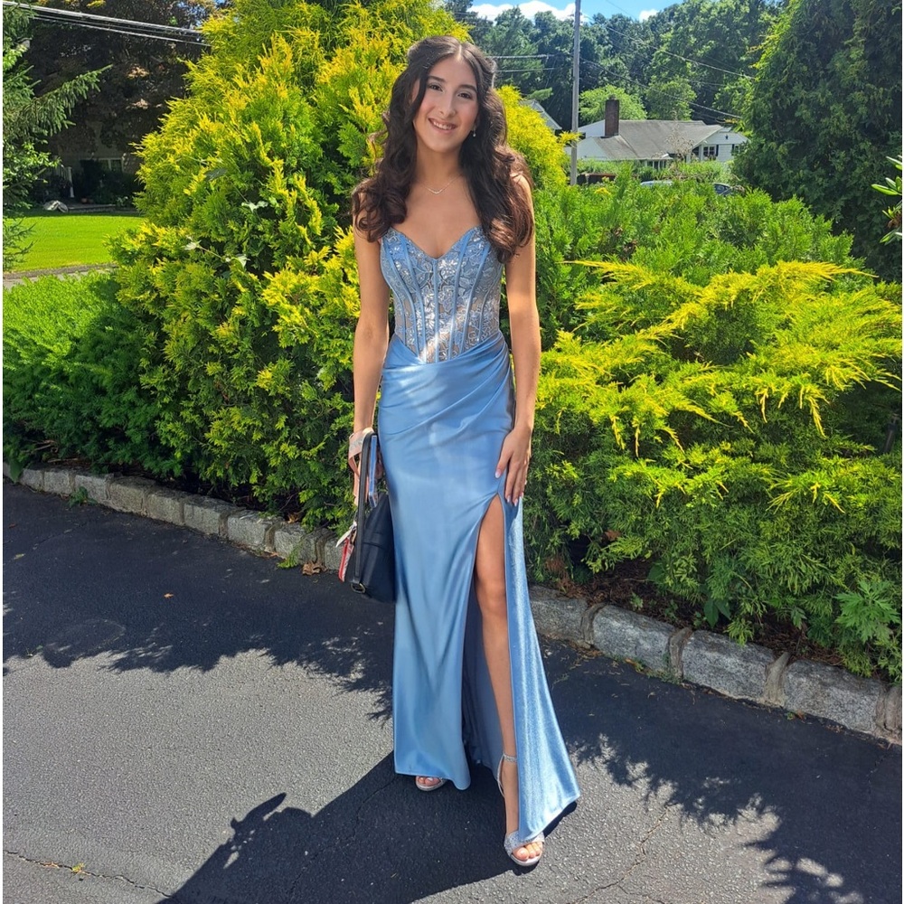 Beautiful pale blue/silver prom dress. Only worn once and in great condition.